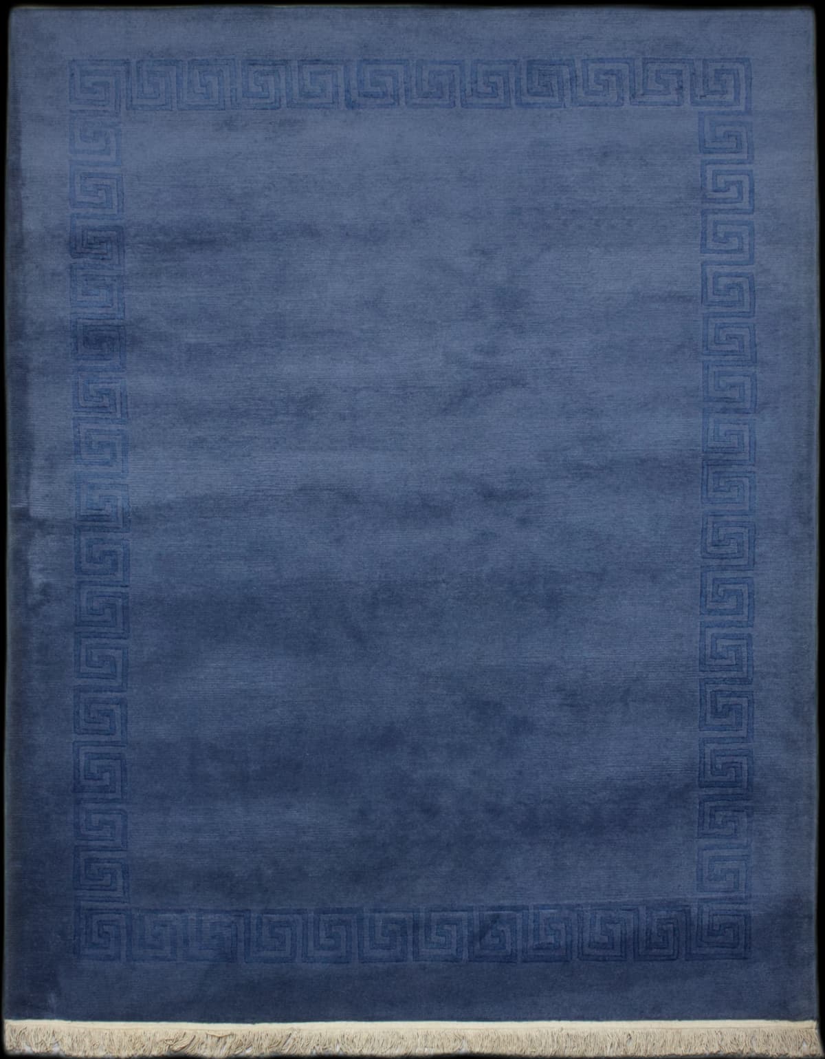 Nepali rug in dimensions 242 centimeters length by 175 centimeters width with mainly blue colors