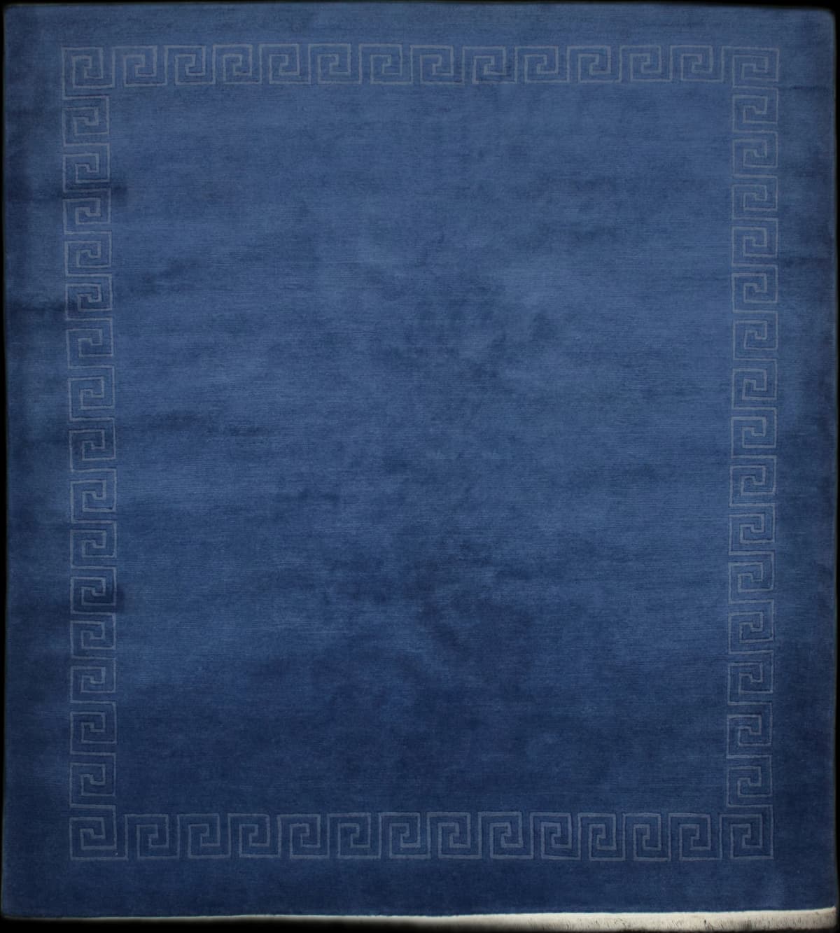 Nepali rug of Tibetan style in dimensions 300 centimeters length by 200 centimeters width with mainly blue colors