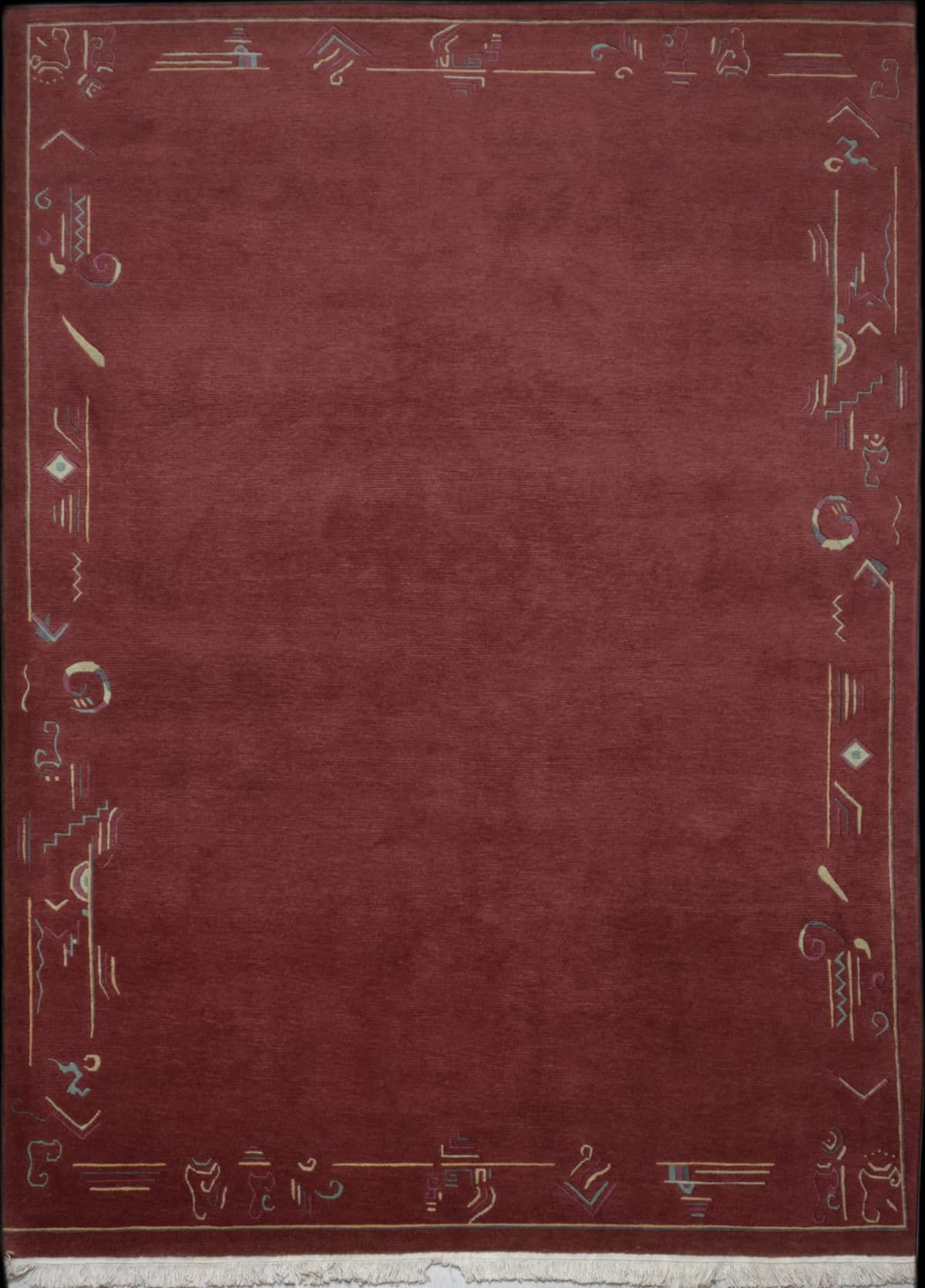 alfombra nepalí en dimensiones 304 centímetros de largo por 202 centímetros de ancho con colores principalmente rojo