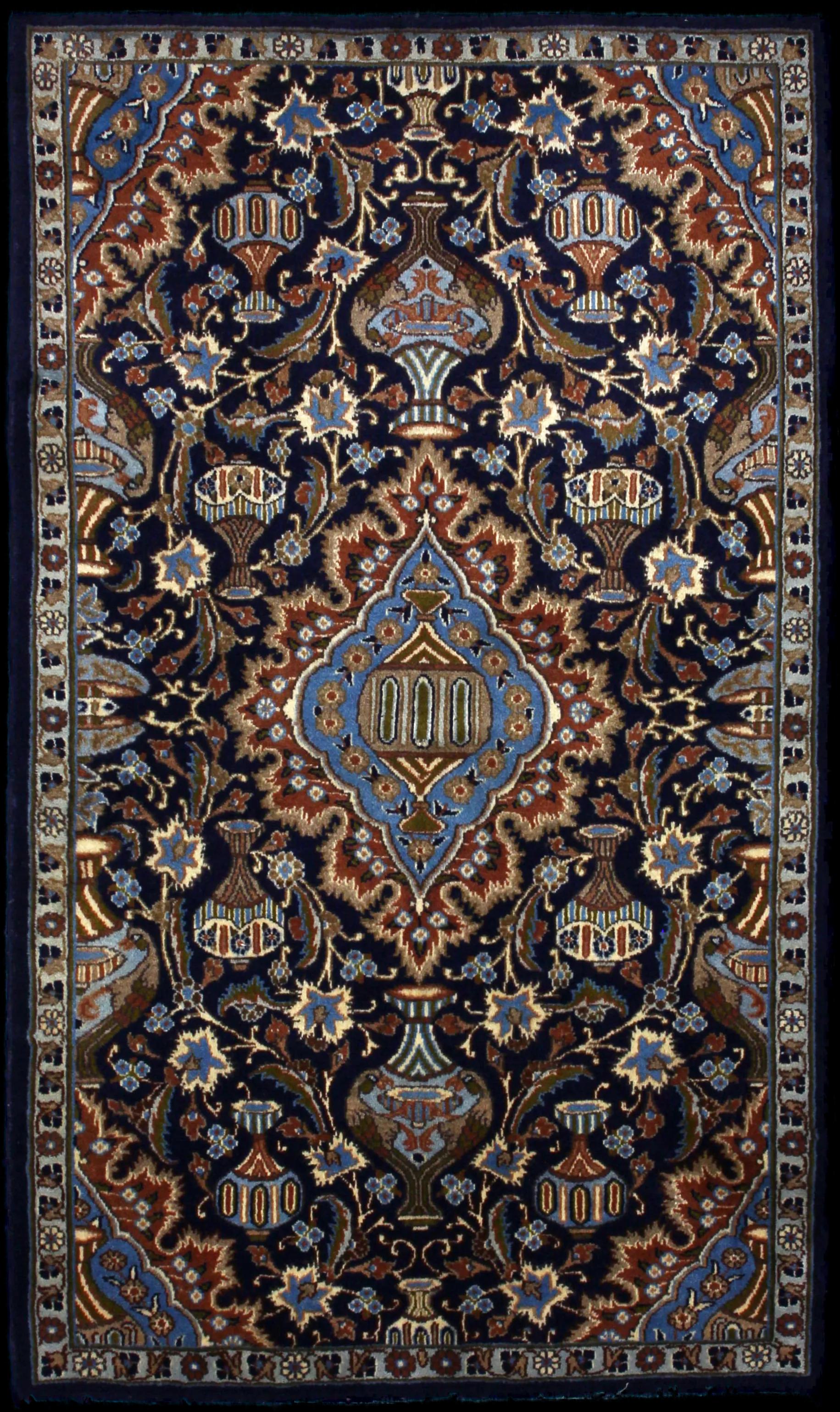 Handmade Persian rug in dimensions 183 centimeters length by 107 centimetres width with mainly Blue and Brown colors