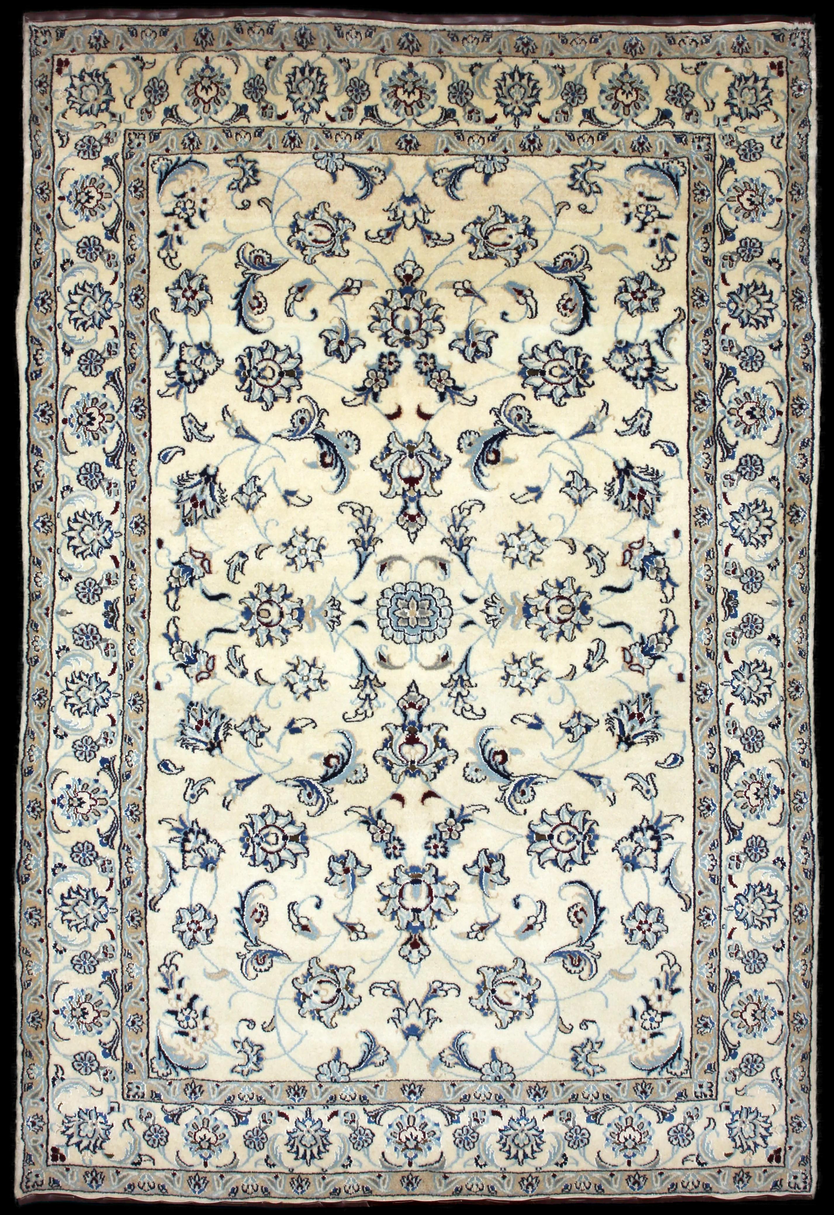 Handmade Persian rug of Nain style in dimensions 240 centimeters length by 162 centimetres width with mainly Beige and Blue colors