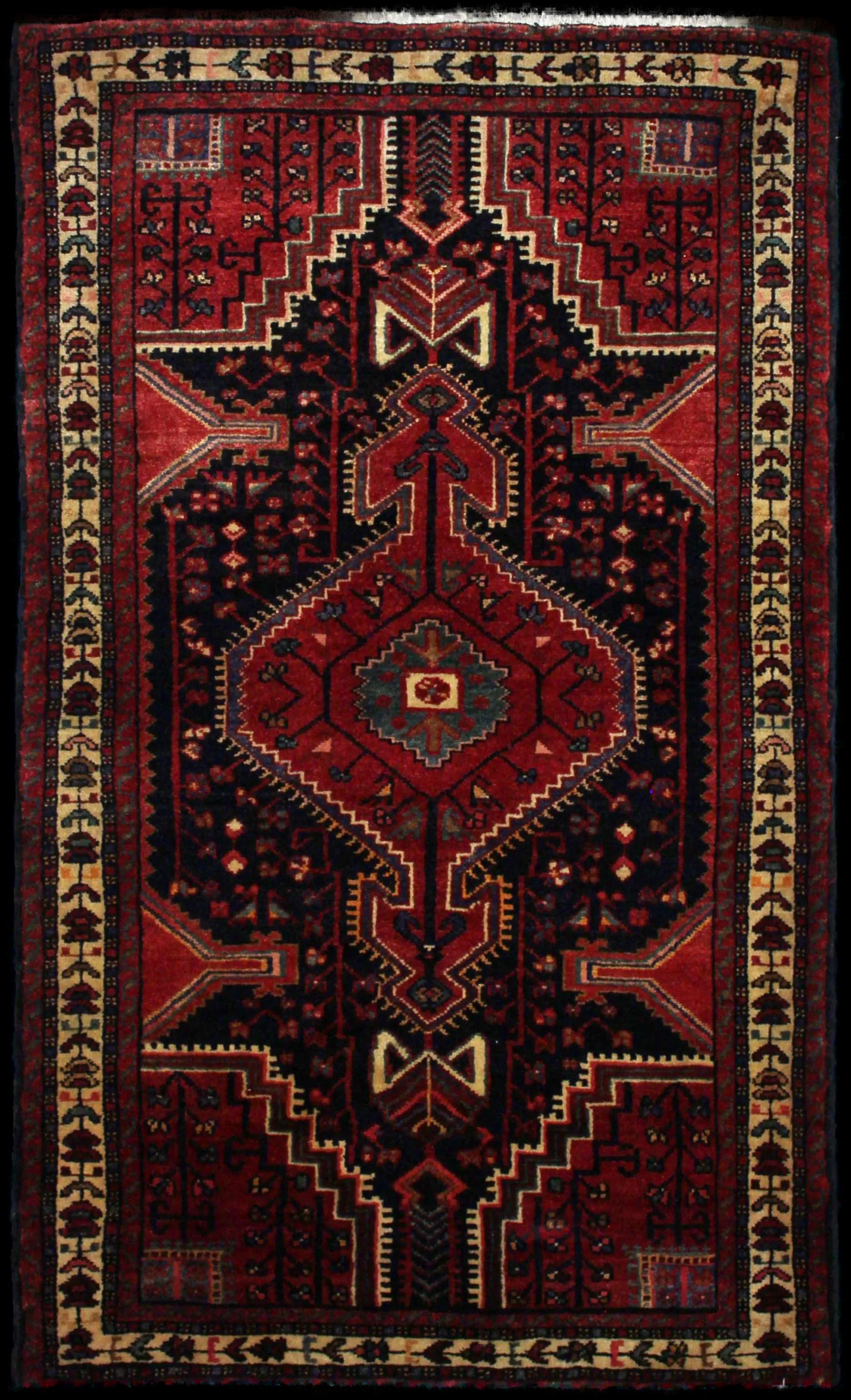 Handmade Persian rug in dimensions 170 centimeters length by 103 centimeters width with mainly Red and Blue colors