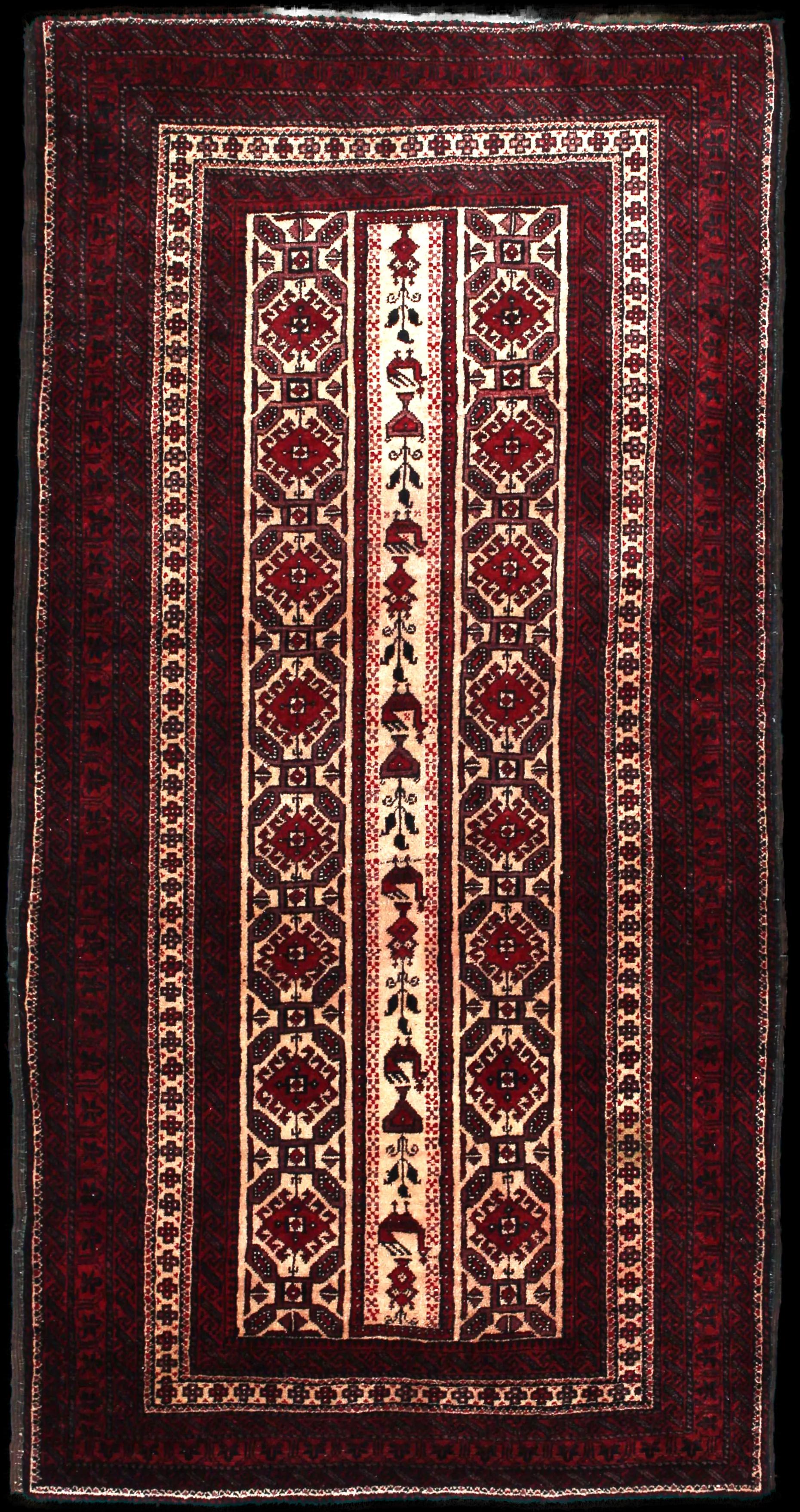 Handmade Persian rug of Baluch style in dimensions 205 centimeters length by 108 centimetres width with mainly Red colors