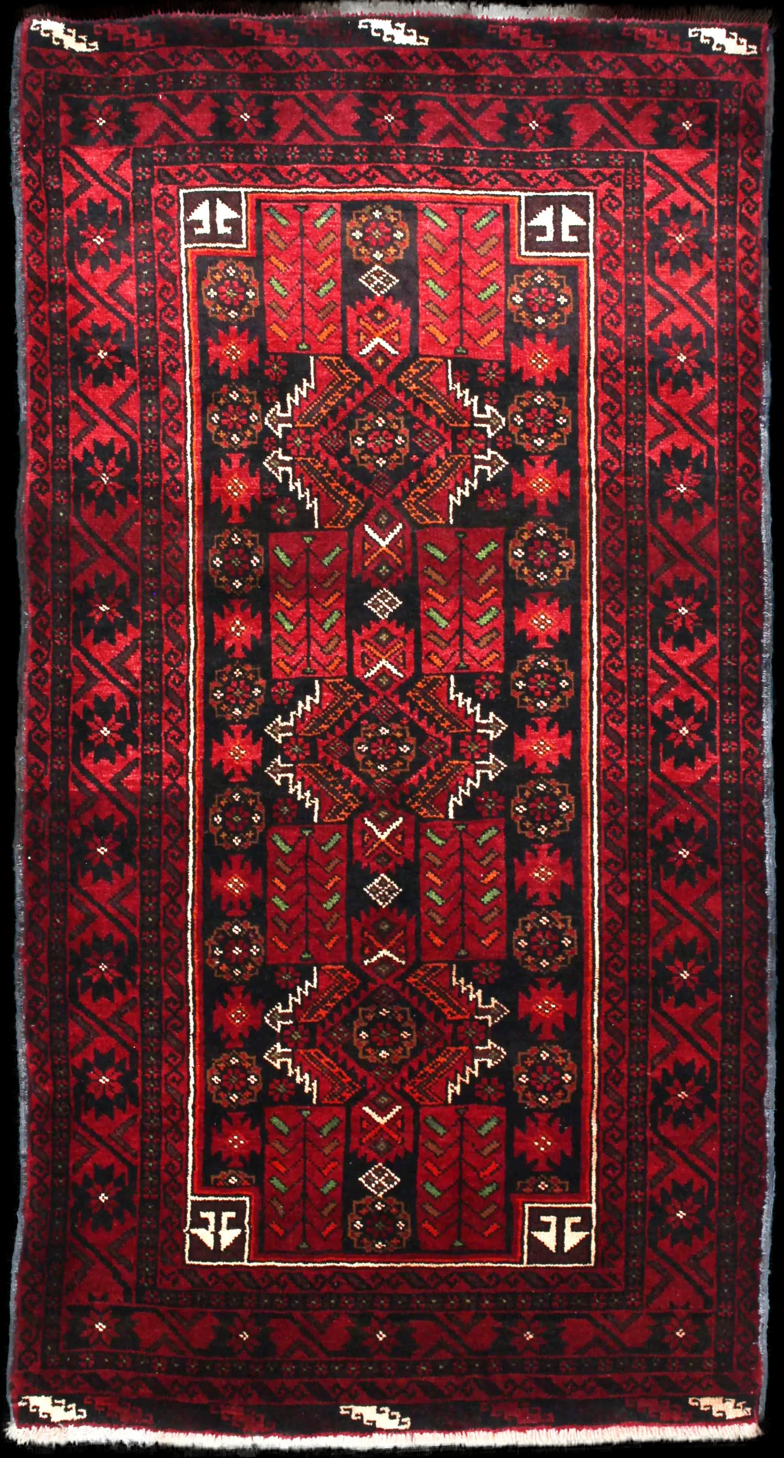 Handmade Persiano rug in dimensions 212 centimeters length by 110 centimeters width with mainly Rosso e Nero colors