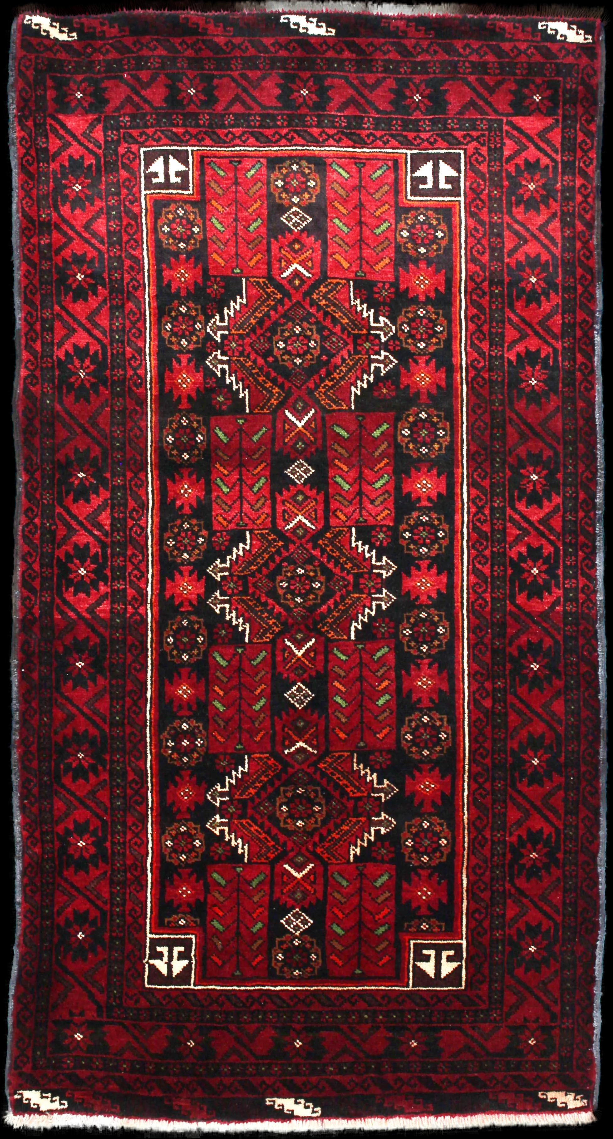 Handmade Persian rug of Baluch style in dimensions 212 centimeters length by 110 centimetres width with mainly Red and Black colors